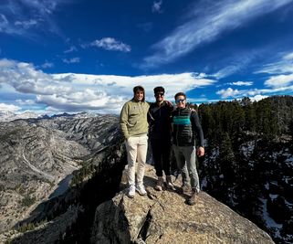 Collin Stephenson on mountain peak