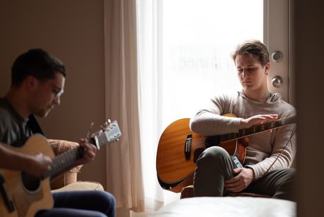 Isaac and Anthony with guitars